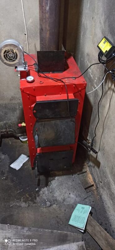 Котлы: Твердотопливный водогрейный котёл с варочной поверхностью Описание: - — 12