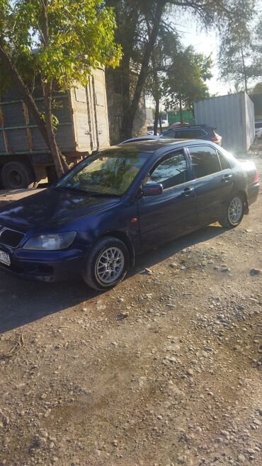 машина ауди: Mitsubishi Lancer: 2001 г., Автомат, Бензин, Седан
