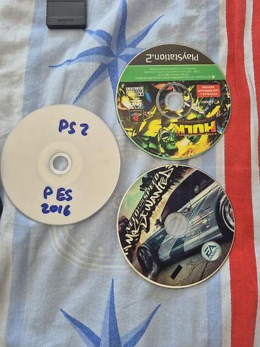 PS2 & PS1 (Sony PlayStation 2 & 1): Sony PlayStation 2 Slim komplekti Paketə daxildir: - PS2 Slim konsolu — 6