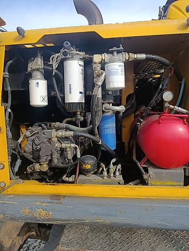 Экскаваторы: Экскаватор, Volvo, 2010 г., Колесный — 11