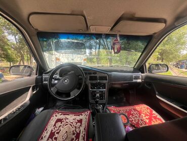 фары на нексии: Черный седан Daewoo Nexia с механической коробкой передач и тканевым