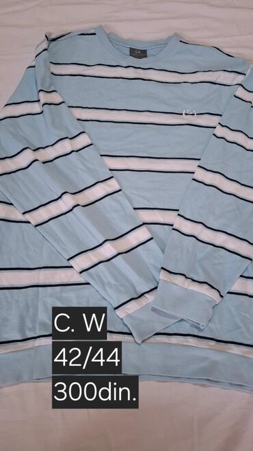 Duksevi: - Dukserica sa kapuljačom, veličina XL. Siva boja. - Muški — 15