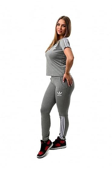 Gornji i donji deo: Trenerke komplet majica kratkih rukava i donji deo. Adidas (logotip na — 8