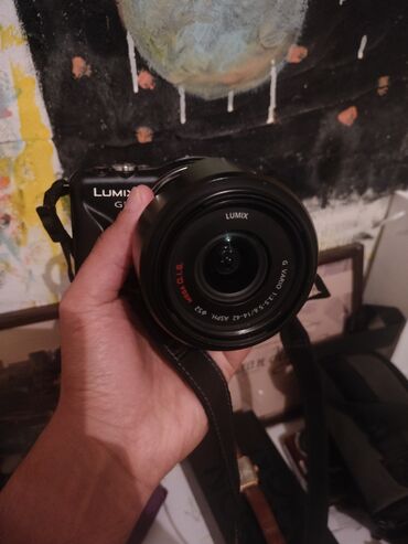bel çanta: Panasonic Lumix GF3 fotoaparat Üzərində 14-42mm lensi var Çox qəşəng