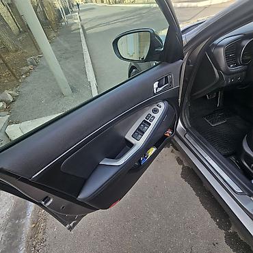 kia optima spoyler: Kia Optima Turbo – sedan Xüsusiyyətlər: - Turbo benzin mühərriki — 7