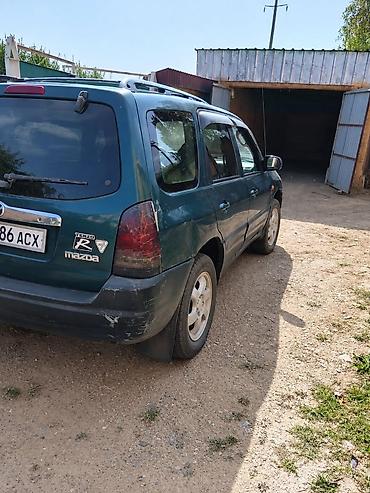 делаем справки: Mazda Tribute: 2001 г., 2 л, Механика, Бензин, Кроссовер — 4