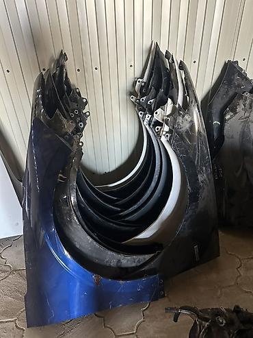 Бампер и комплектующие: Бампер Kia, Оригинал — 57