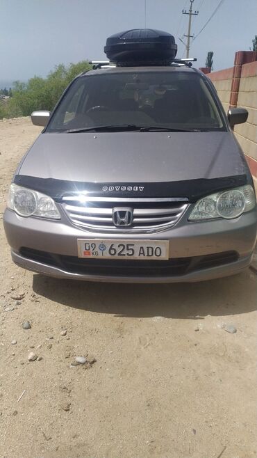 разбор грузовых авто бишкек: Минивэн Honda Odyssey 2,3 4WD серого цвета, оснащенный багажником на