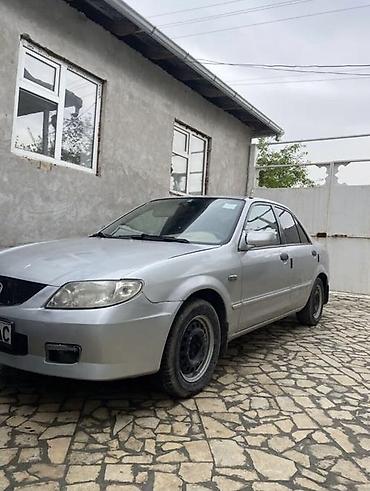 аренда mazda 323: Mazda 323: 2003 г., 1.4 л, Механика, Бензин, Седан — 1