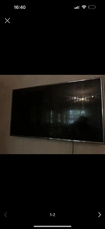 smart tv box: Divar askısı ilə quraşdırılmış düz ekran televizor. Xüsusiyyətlər: - — 2