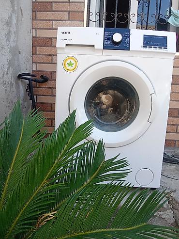 corab toxuyan: Vestel önyükləməli paltaryuyan maşın - Model: VP 7104 (paneldə qeyd — 3