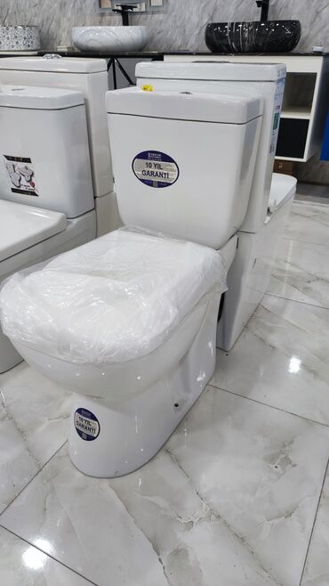 Təmir və tikinti: Ağ rəngdə, yerdə dayanan unitaz, hamam otaqları üçün idealdır. Bu