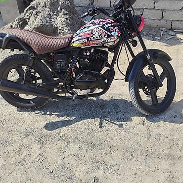 Bobber/kafe-reyser üslubunda modifikasiya olunmuş motosiklet at lalafo.az — 1 Bobber/kafe-reyser üslubunda modifikasiya olunmuş motosiklet — 1