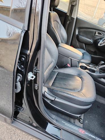 panorama maşın: Hyundai Tucson: 0.2 l | 2009 il Krossover — 6