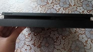 assassin: Sony PlayStation 4 Slim oyun konsolu Xüsusiyyətlər: - Model: PS4 Slim — 3