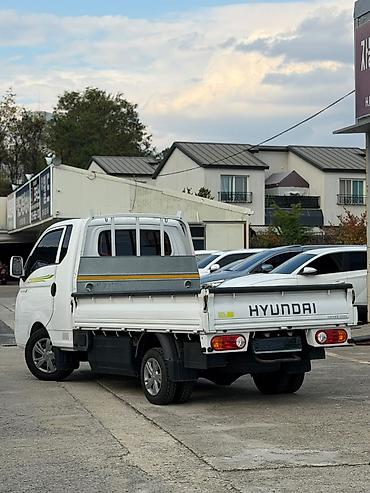 wuling starlight 730: Hyundai Porter (портеровский малотоннажный бортовой грузовик), белый — 7