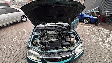 Mazda: Mazda 323: 2003 г., 1.6 л, Автомат, Бензин, Универсал — 9