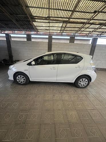 тойота аква гибрид: Toyota Aqua: 2013 г., 1.5 л, Автомат, Гибрид — 7