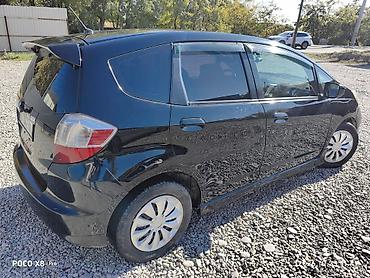 гранд хайлендер гибрид: Honda Fit: 2009 г., 1.5 л, Автомат, Бензин, Хэтчбэк — 4