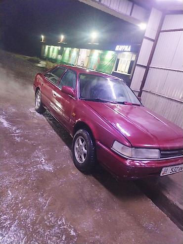 Oldsmobile: Mazda 626: 1990 г., Кол менен иштөөчү, Бензин, Седан — 2
