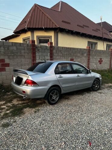 митсубиси спаке стар: Mitsubishi Lancer: 2004 г., 1.6 л, Механика, Бензин