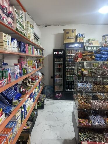 Mağazalar: Şəhərin binə atciliqda mərkəzində yerləşən, tam təchiz olunmuş ərzaq — 3