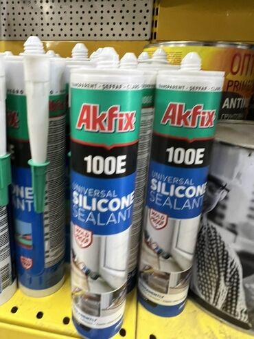 плиточный клей: Универсальный силиконовый герметик Akfix 100E предназначен для