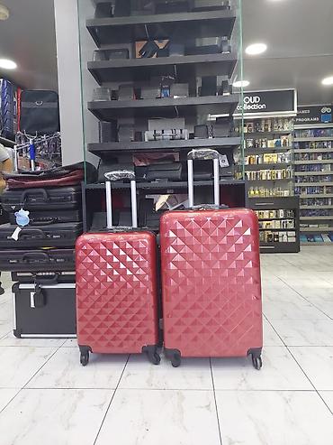 Çamadanlar: Qırmızı sərt korpuslu səyahət çemodanları – 2 ölçü - Korpus: sərt — 1