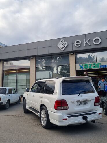 Toyota: Toyota Land Cruiser 2002 – baxımlı, əziyyət görməyib. Ağ rəngdədir — 18