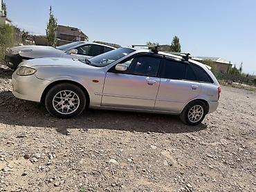 портер 133: Mazda Familia: 2001 г., 1.6 л, Механика, Бензин, Хэтчбэк — 2