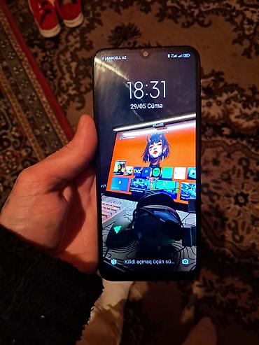 telefonlae: Poco C40, 64 GB, rəng - Qara, Barmaq izi — 2