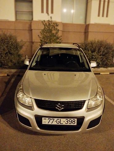 suzuki moto: Suzuki SX4 – gümüşü rəngli, şəhər və rayon yolları üçün praktik — 2