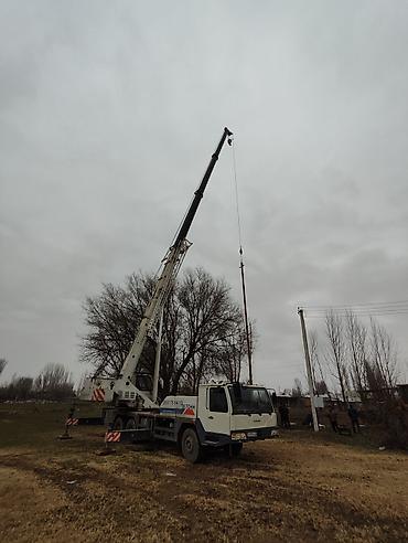 Услуги автокрана: Стрела 48 м, 25 т — 10