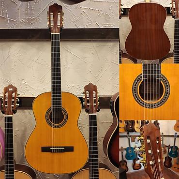 Гитары: Klassik gitara Smiger EC 350 Simlərin sayı: 6 Çanta hədiyyə Ölçü:4/4 — 1