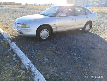 аварийный машины: Mazda 626: 1994 г., 2 л, Автомат, Бензин, Хэтчбэк