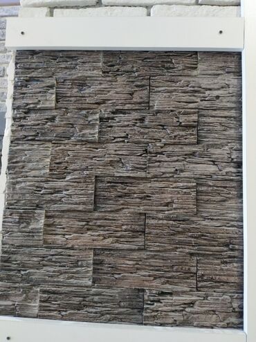 apşivka taxta: Dekorativ divar örtüyü – taxta teksturasını xatırladan qəhvəyi daş at lalafo.az apşivka taxta: Dekorativ divar örtüyü – taxta teksturasını xatırladan qəhvəyi daş