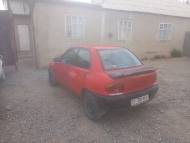 авто газ бензин: Mazda 121: 1991 г., 1.3 л, Механика, Бензин, Седан