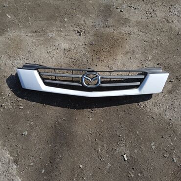 Решетки радиатора: Решетка радиатора Mazda Б/у — 26