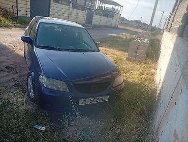 mazda kronus: Mazda 323: 2001 г., 1.6 л, Механика, Бензин, Универсал — 3