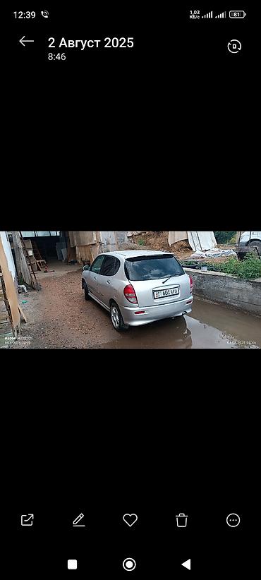 Toyota: Toyota Дуэт: 2002 г., 1.3 л, Механика, Бензин, Хэтчбэк — 6