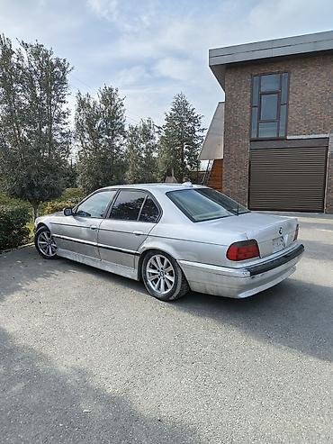 bmw f10 lip: BMW 7 Series sedan (E38), gümüş rəngli, 4 qapılı, arxa ötürücülü — 4