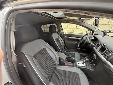 opel sukanı: Opel Vectra C sedan, gümüşü rəng. - Kuzov: 4 qapılı sedan — 4