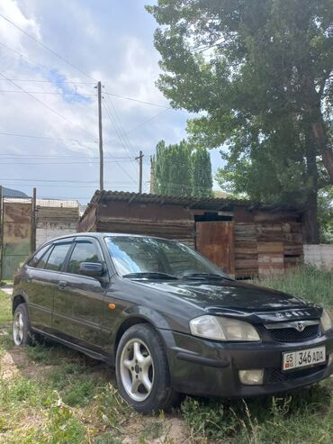 Mazda: Mazda 323: 1999 г., 1.6 л, Механика, Бензин, Хэтчбэк