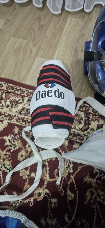 Qoruyucu aksesuarlar: Taekvondo üçün tam qoruyucu dəst – Daedo Komplektin tərkibi: - Daedo — 7