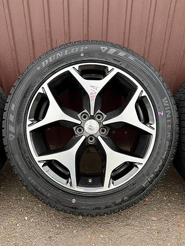 82 2: Комплект колес Subaru с зимними шинами Dunlop - Диски: оригинальные — 3
