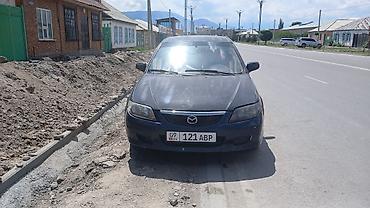 форт грзовой: Mazda 323: 2002 г., 1.6 л, Механика, Бензин, Хэтчбэк — 1