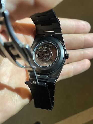 tap.az saatli: Tissot avtomatik qol saatı – qara metal bracelet və skelet mexanizmli — 1