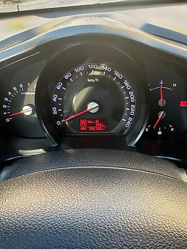 Kia: Kia Sportage: 2 l | 2011 il Universal — 12