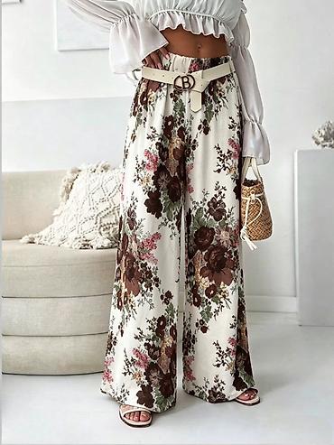 sandale platforme: Ženske široke palazzo pantalone sa floralnim printom
1900
Din
S M L — 4