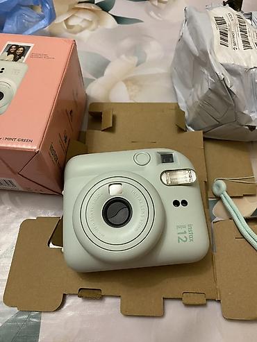 планшет с симкой: Fujifilm Instax Mini 12 — мгновенная камера в цвете Mint Green. - — 1